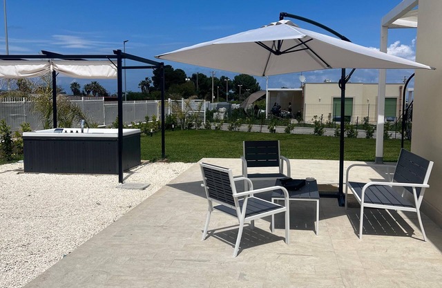 Exclusive villa with outdoor Jacuzzi, from the terrace view of Etna and the sea