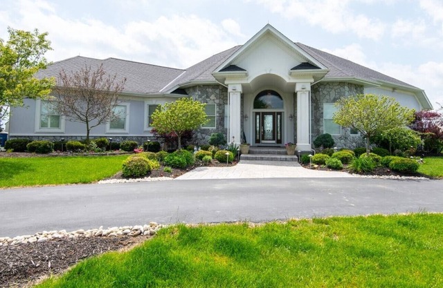 Executive home on acreage and on a golf course.