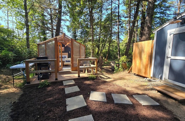 Experience Coastal Bliss in a Stunning Glass House Glamping Retreat