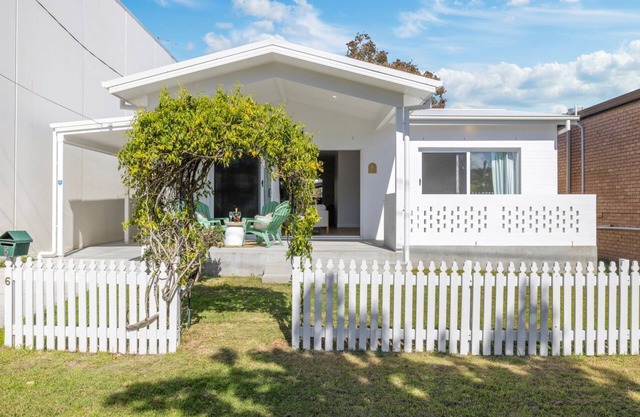 Experience the perfect blend of beachside charm and stylish holiday living