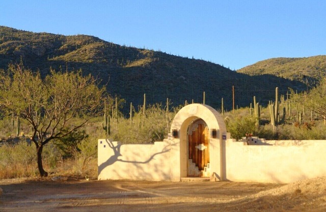Experience true desert living in this classic Tucson ranch in the Tanque Verde Valley