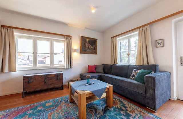 Experience unparalleled comfort at Alpenpuls with breathtaking mountain views!
