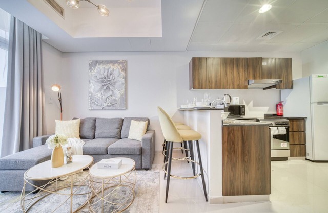 Exquisite 4BR Townhouse at DAMAC Hills 2 Victoria by Deluxe Holiday Homes