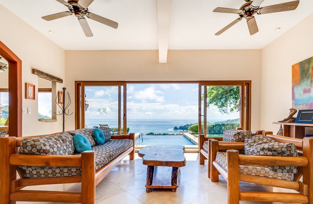 Exquisite ocean-view villa with balcony, plunge pool, patio, & central AC