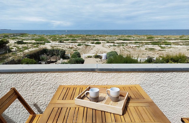Facing the sea, direct beach access