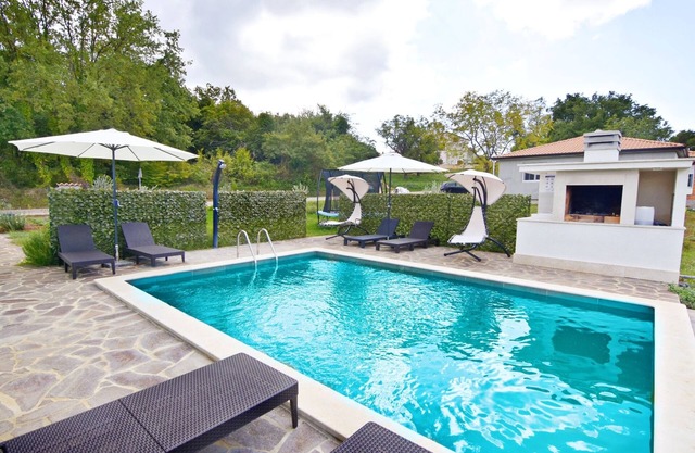 Family friendly house with a swimming pool Buroli, Umag (K-22400)