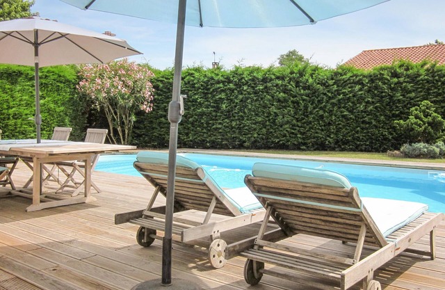 Feel at home in this family vacation home with swimming pool!