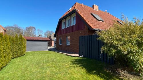 Ferienhaus kleiner Leuchtturm - Steuerbord Fehmarn Kopendorf - mit Garten und Terrasse