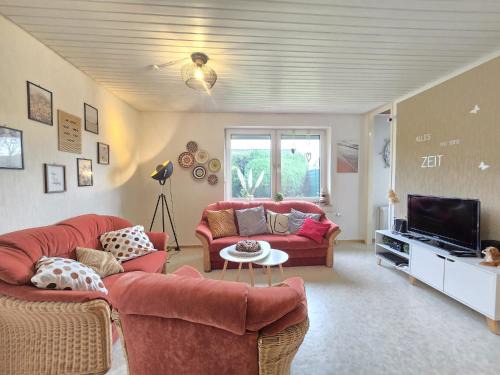 Ferienhaus Lüttje Uttiet mit eingezäunten Garten