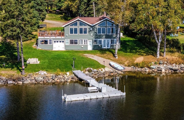 Fielding Lakehouse - Spacious home with nice grass area leading to Rangeley Lake