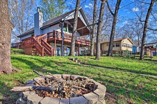 Fire Pit and Boat Slip Waterfront Grove Getaway
