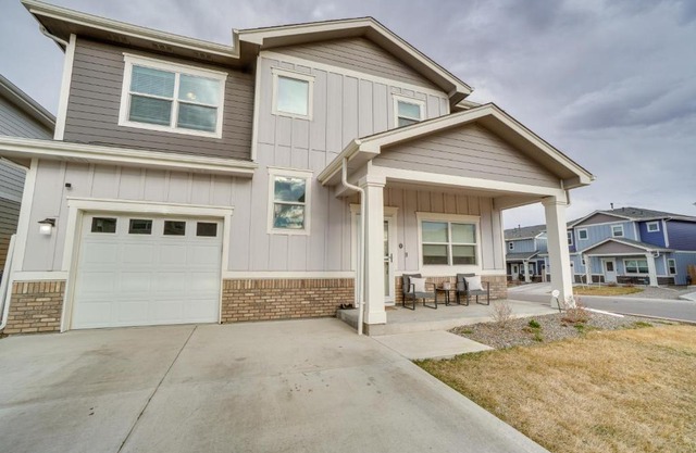 Fire Pit and Shuffleboard Suburban Denver Home
