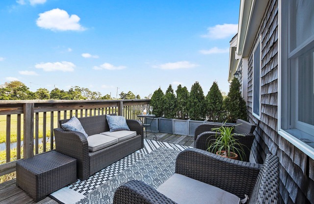 FULLY RENOVATED apt w/water views and deck near beach& marina