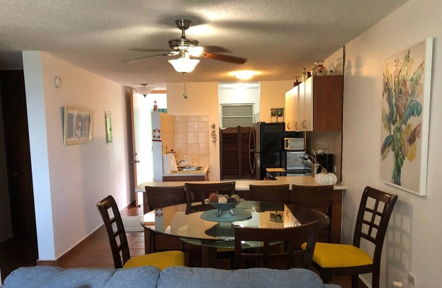 Garden apartment steps from the beach and pool, WiFi, Smart TV, screens.