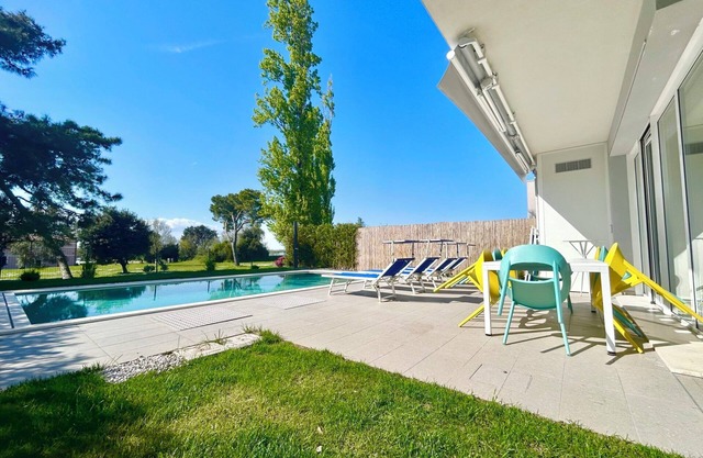 Golden hour retreat lagoon view villa with pool