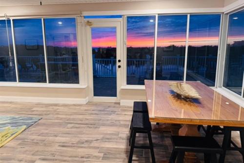 Gorgeous vacation home on the water with heated pool and sand!
