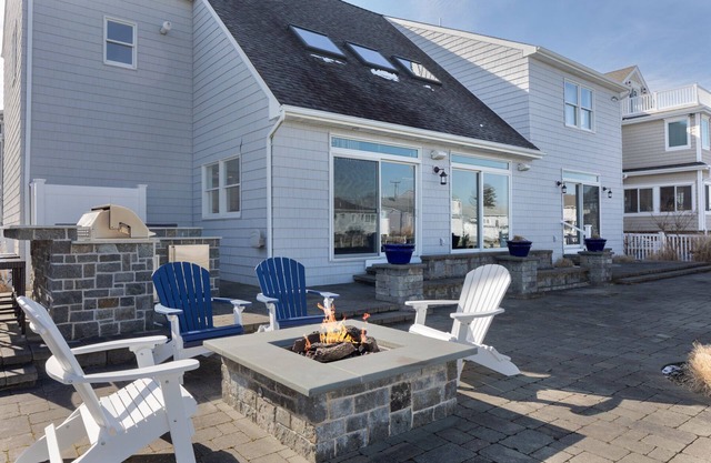 Gorgeous waterfront Home on lagoon steps away from private beach. Sleeps 12