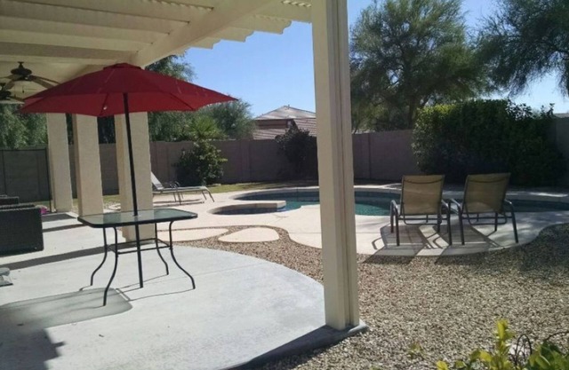 Great Palm Valley home with private heated pool/spa in quiet neighborhood