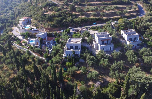 Greek 140 m2 stone house , 3 bedrooms, with beautiful sea and mountain views.