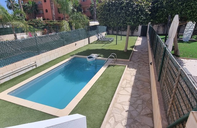 Ground floor apartment with garden and private pool, 50 m from the beach, WIFI