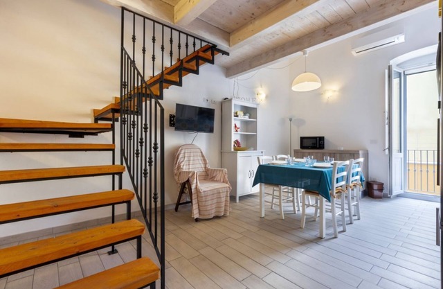 GuestHost- Bright Apartment 250meters from the Sea