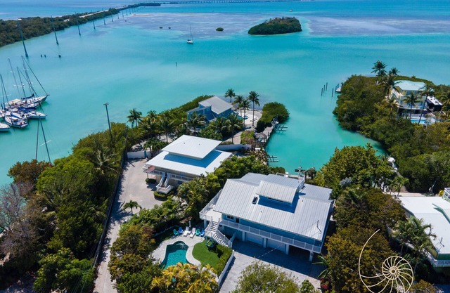 Harbor Hideaway ~ Island style beach house with pool, dockage & bay views!