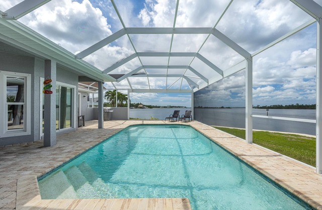 Heaven Found! Stunning River Views & Pool - Villa Island Sunset - Roelens Vacations