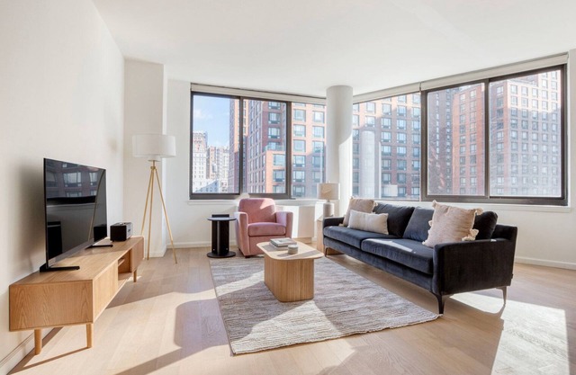 Hip Flatiron 2BR w/Gym & Doorman, nr Union Square Park, by Blueground