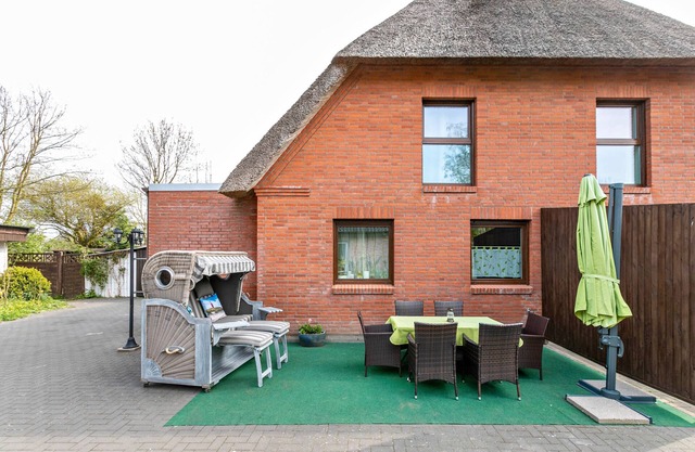 Holiday Apartment "Nordlicht" in a Thatched House with Terrace and Wi-Fi