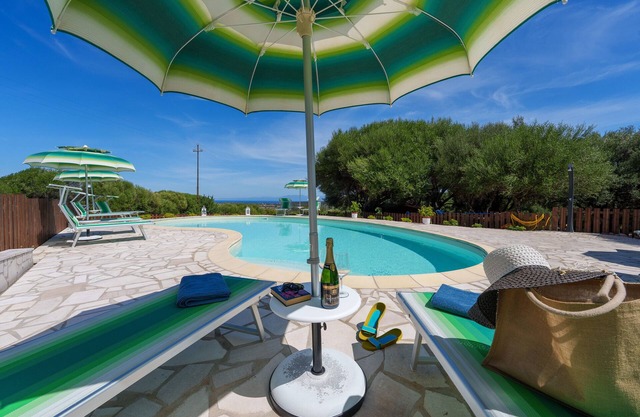 Holiday Apartment "Casa Ginestre" with Sea View, Shared Pool and Wi-Fi