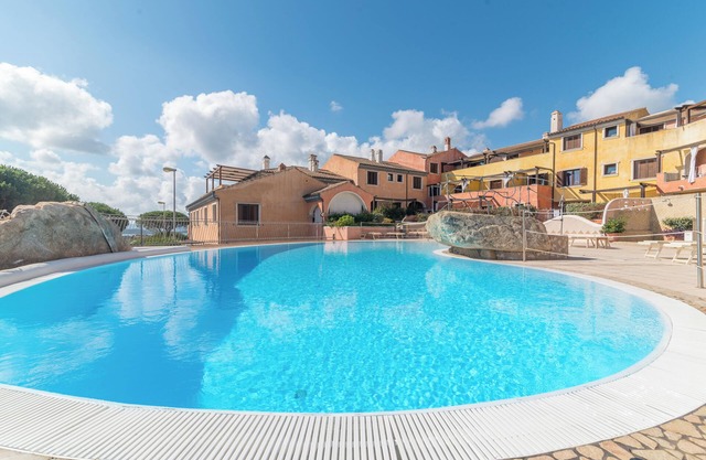 Holiday Apartment "C 102 Puntavilla Mare" with Pool, Garden, Terrace, A/C & Wi-Fi