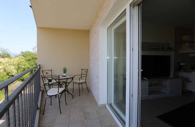 Holiday apartment mit Klimaanlage und seitlicher Meerblick