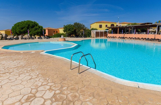 Holiday Home 'Appartamento Residence Mirice' with Shared Pool, Wi-Fi and Air Conditioning