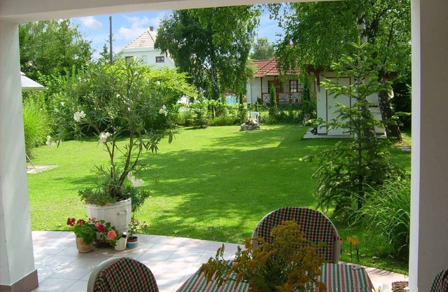 Holiday home with garden and garden shower
