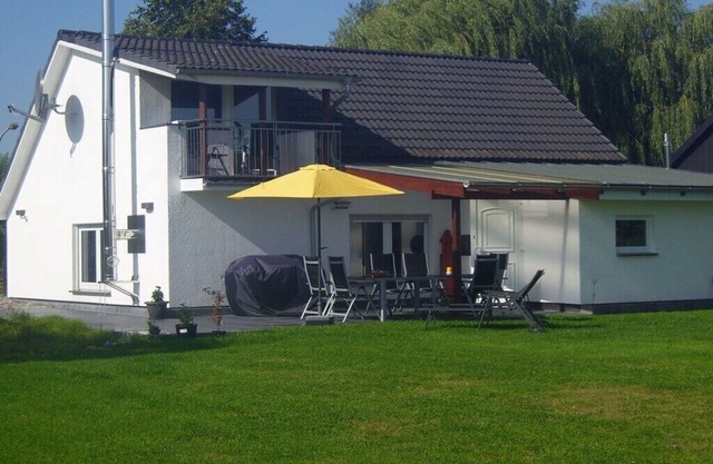 Holiday home in Kudensee with swimming pool