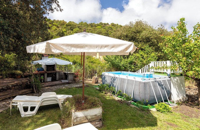 Holiday Home 'La Casa Nel Bosco' with Shared Pool, Wi-Fi and Air Conditioning