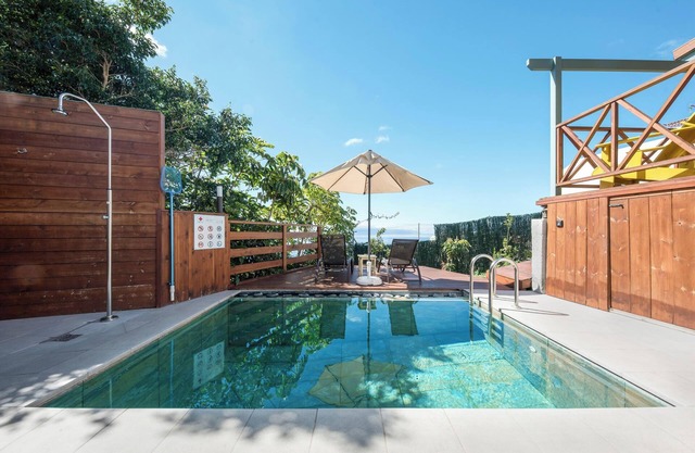 Holiday Home 'Las Hermanas I' with Sea and Mountain View, Shared Pool & Garden