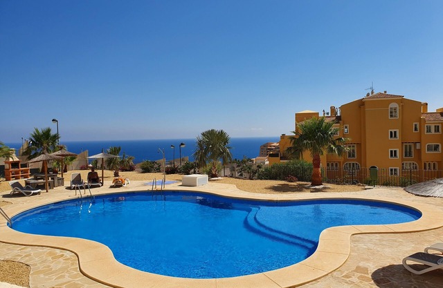 Holiday Jazmines Apartment with pool and sea view