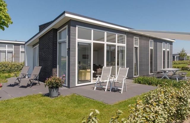Home with comfortable interior and view of the landscape.