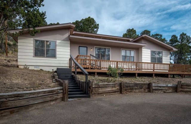 Hopkins! One level cabin with easy access nestled in the pines
