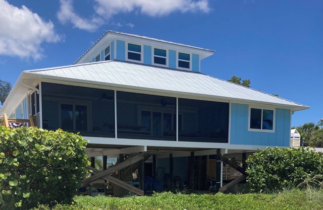 Hot tub steps from the beach with private dock for fishing