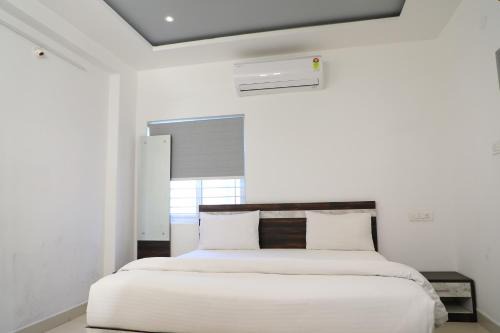 HOTEL ATHIDHI ROOMS & SUITES