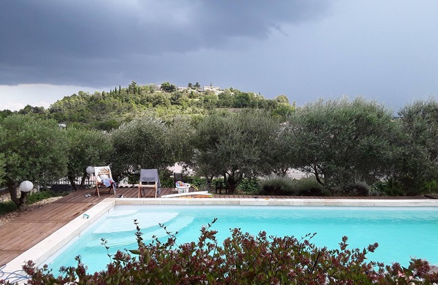House with heated pool and superb view of Lussan