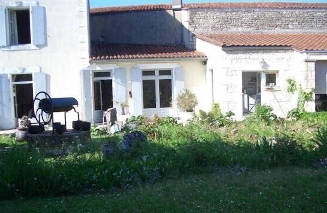 House with pool in the heart of a village