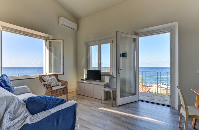 'Il Quartiere Apartment Montecristo' with Sea View, Terrace & Wi-Fi