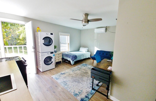 In unit laundry. AC, Modern Studio with desk and parking