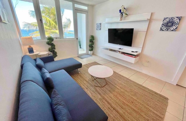 Island Dream: Beach Front Condo with Pool