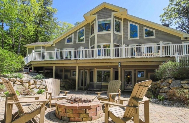 * JULY SPECIAL * Stunning and spacious waterfront home on Raymond Pond