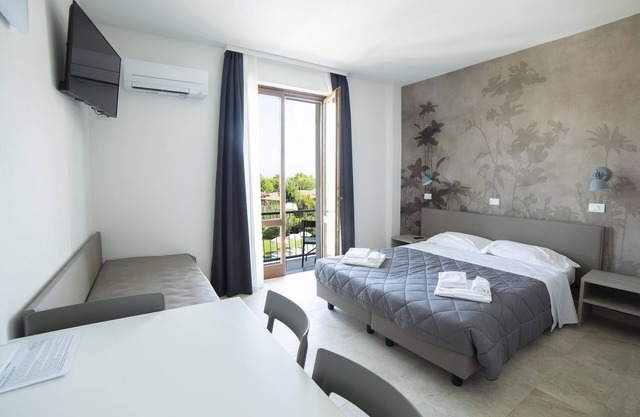 Junior Suite 2 with Shared Pool & Balcony
