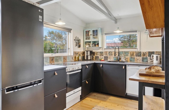 Just a short walk from the sandy beach, this practical vacation home welcomes you.